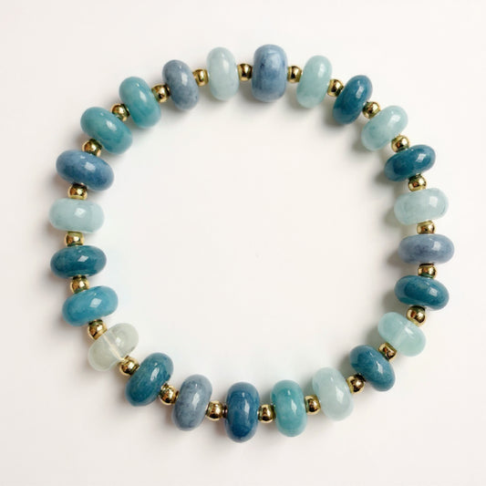 blue quartz rondelle beaded stretch bracelet with gold by Hope and Raye