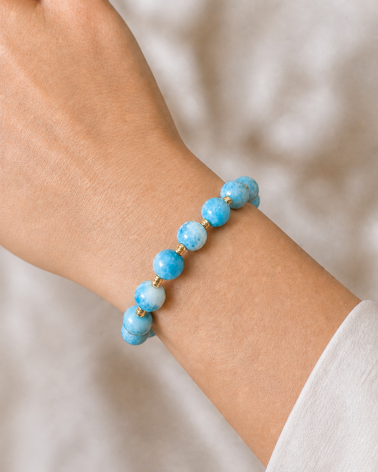 Handcrafted blue larimar gemstone bracelet with gold spacer beads by HOPE & RAYE