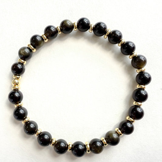 Black beaded stretched bracelet handcrafted in Atlanta, Georgia USA by a woman-owned jewelry designer, Hope & Raye. Perfect for holiday gifting. Ships gift-ready in a signature jewelry box with velvet pouch.