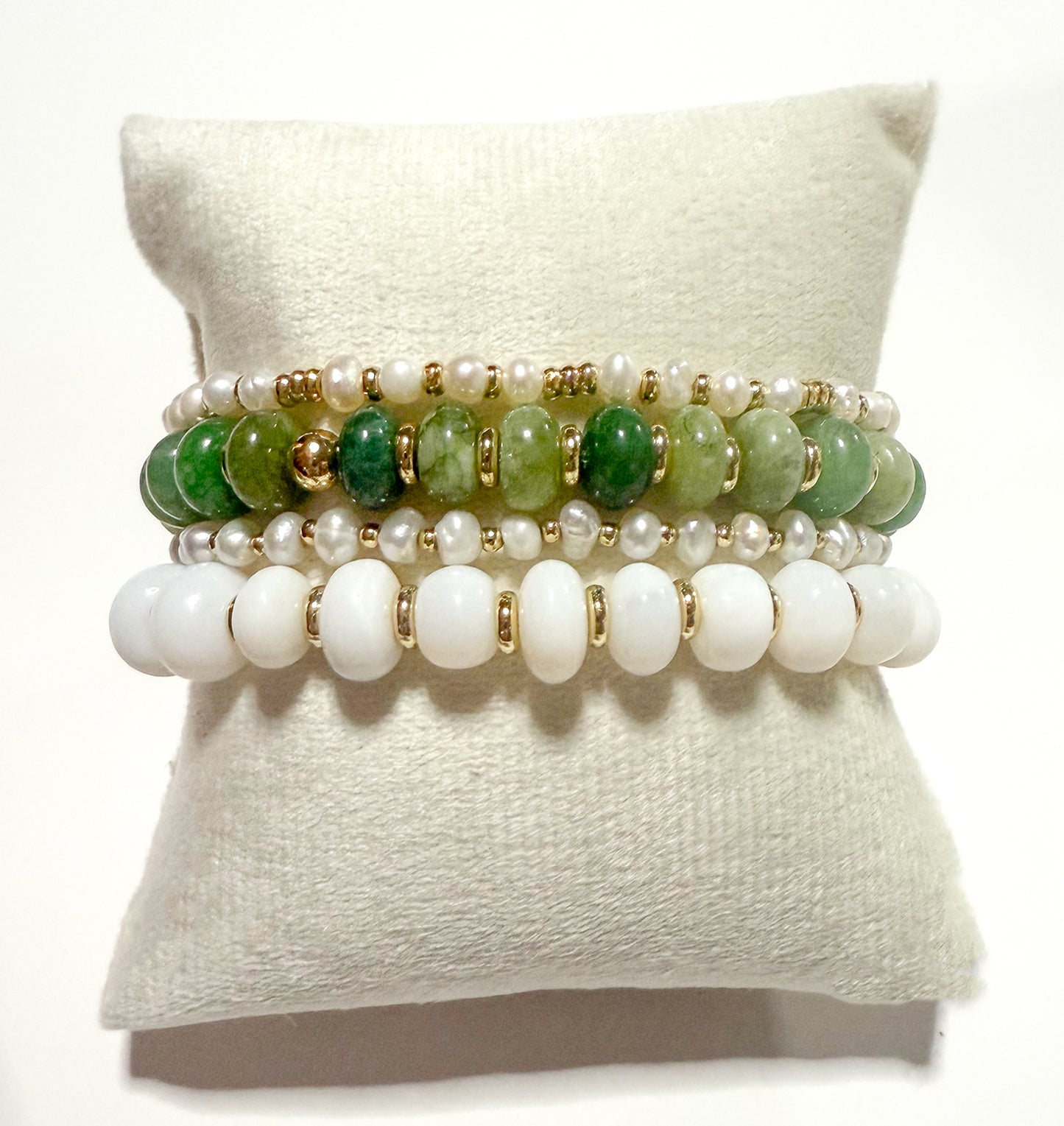 Green beaded stretch bracelet stack with quartz, opal, jade, freshwater pearls and gold.