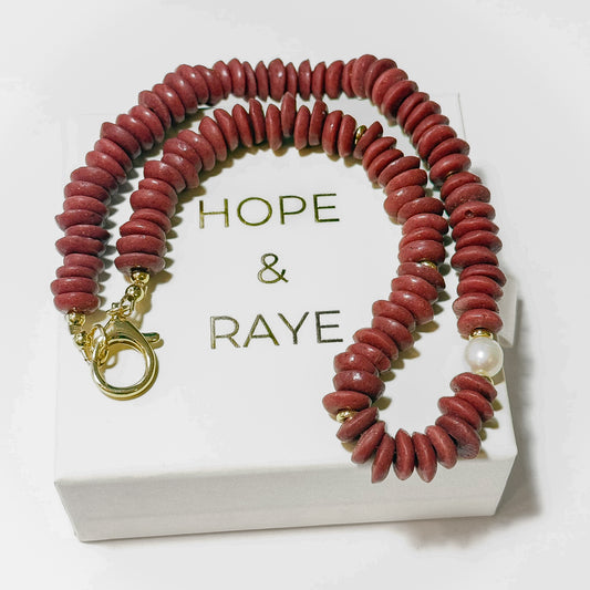 Maroon/Crimson Disc 16 inch necklace with gold discs, gold clasp and natural pearl. Perfect for gameday and a thoughtful holiday gift for the Alabama fan or Mississippi state fan. Handcrafted in Atlanta.