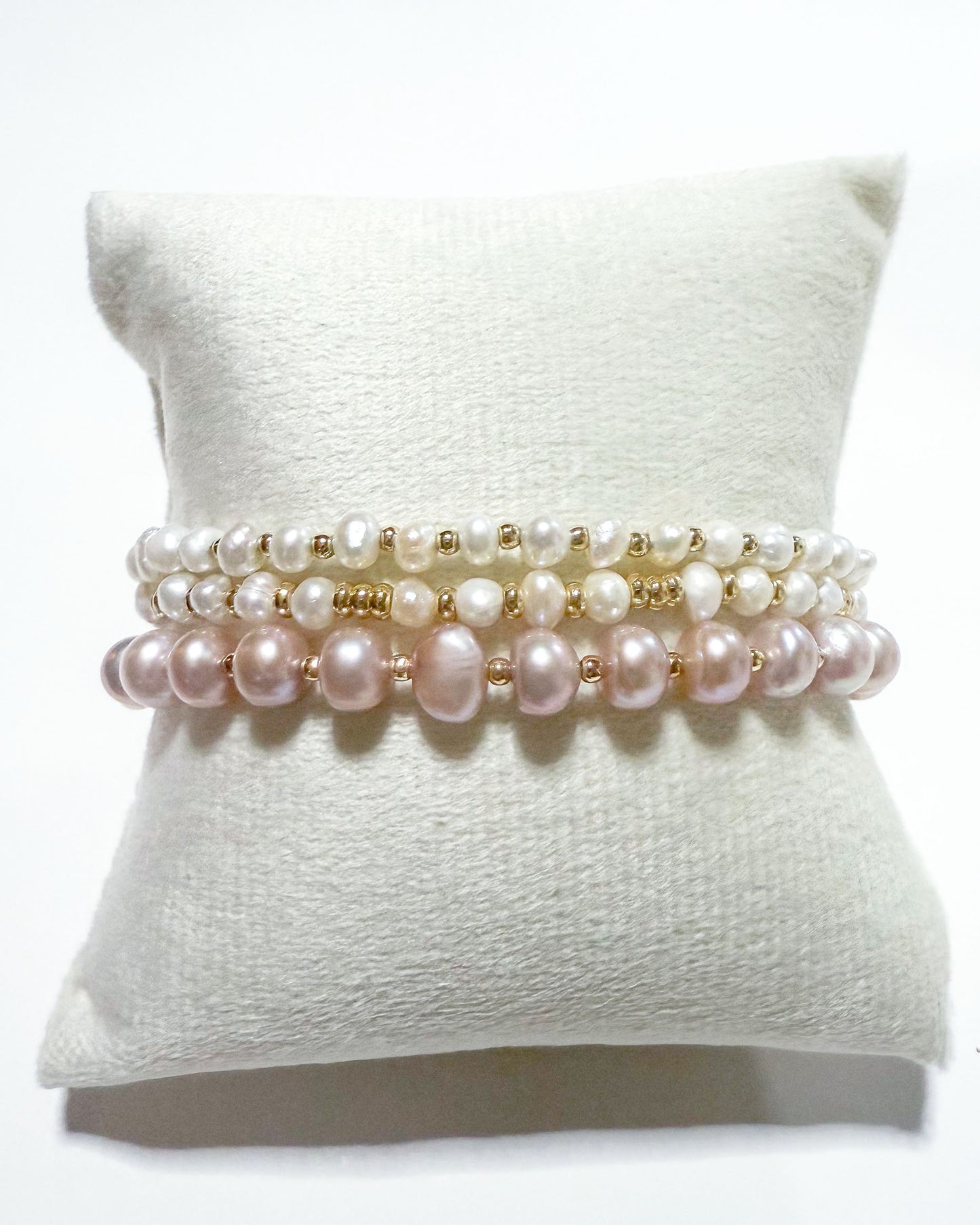 Dainty champagne pearl pink and white gold beaded bracelet stack of 3 by hope and raye.