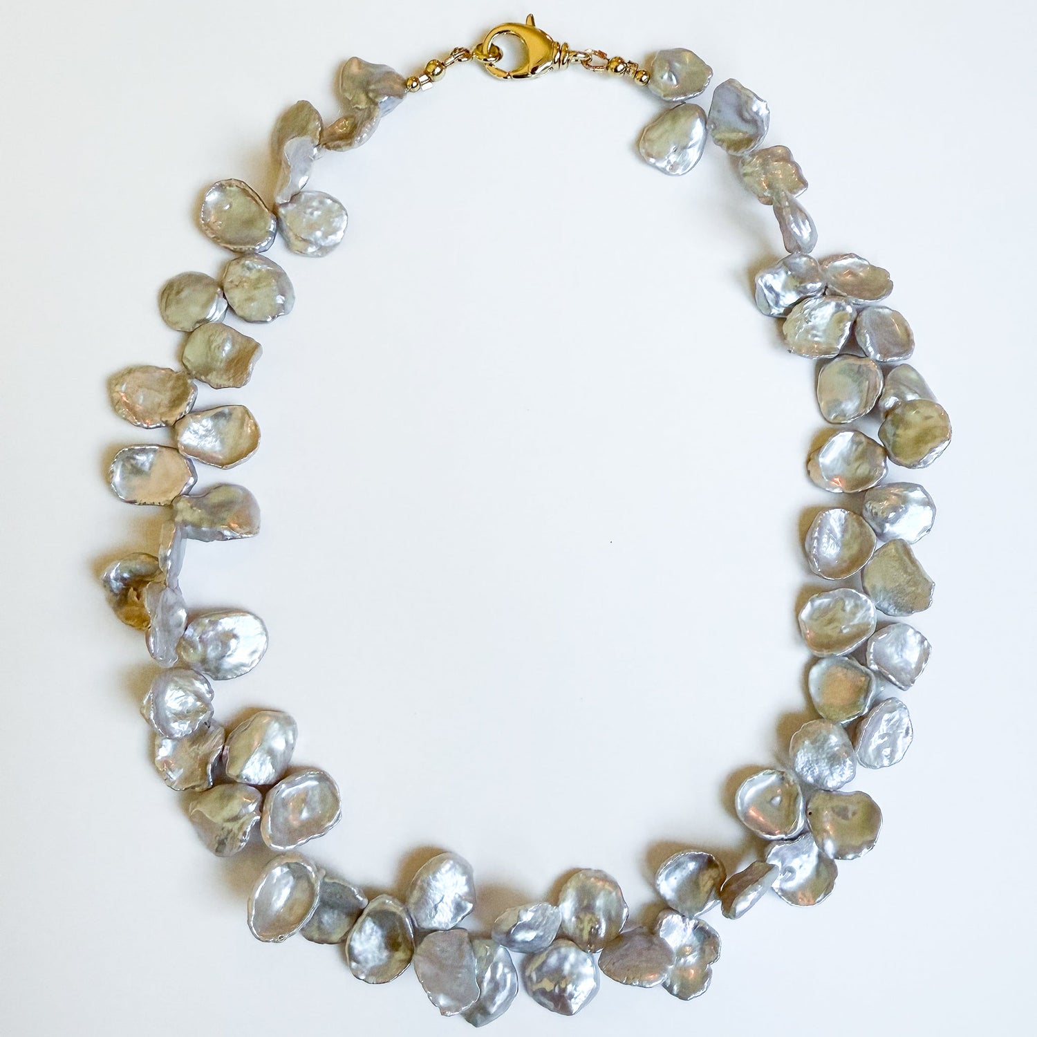 Pearl and gemstone statement necklaces for holiday parties - handcrafted jewelry in Atlanta.