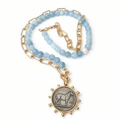 Aquamarine and gold statement necklace with horse pendant. Natural stones 18k gold filled chain by HOPE & RAYE.