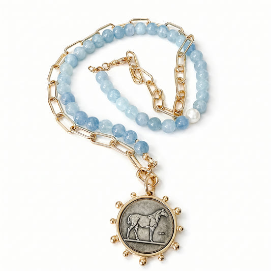 Aquamarine and gold statement necklace with horse pendant. Natural stones 18k gold filled chain by HOPE & RAYE.