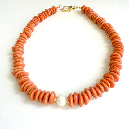 Auburn gameday necklace with orange beads and freshwater pearl. No tarnish 18k gold- filled clasp and beads to last season after season. Hope & Raye in Atlanta, GA 