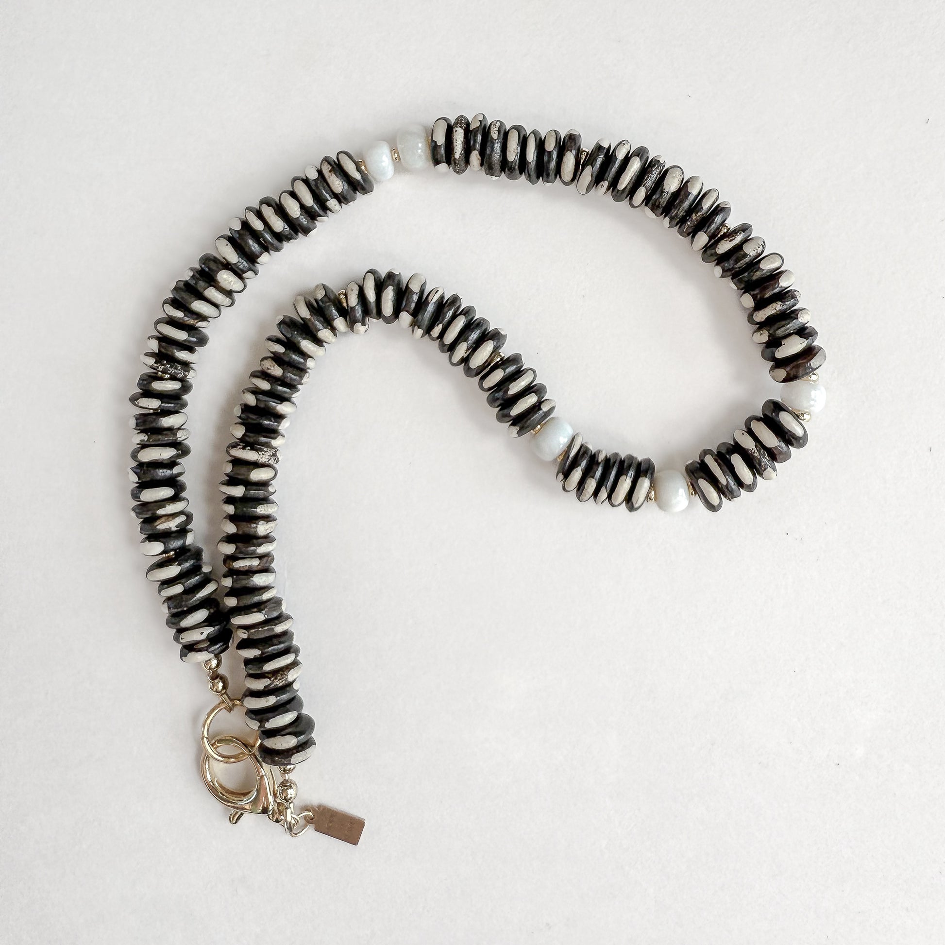 Dalmatian Jasper 17 inch Necklace with White Opal and Gold-Filled Clasp. Designed by Hope and Raye in Atlanta, GA. 