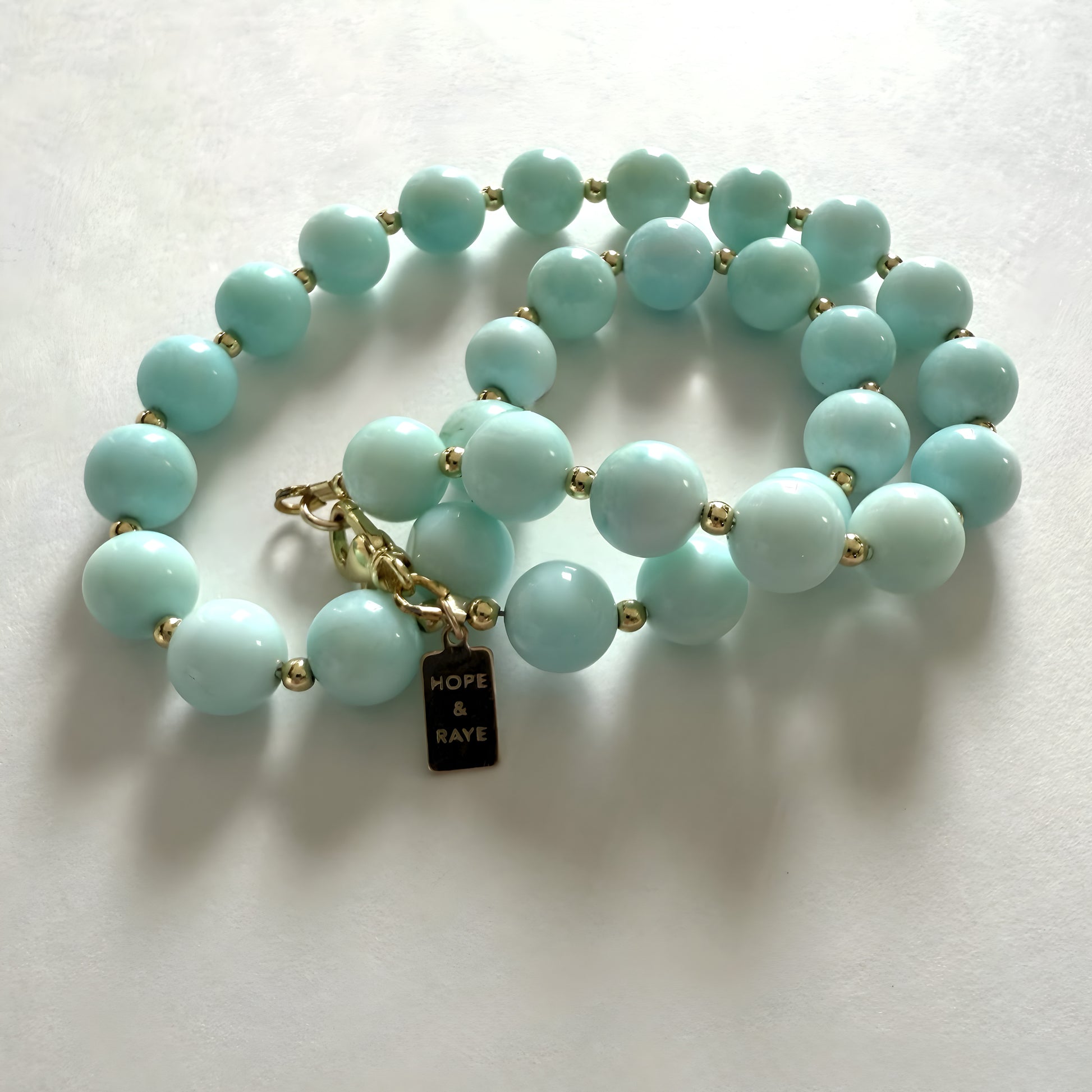 blue opal beaded necklace with gold clasp by hope and raye