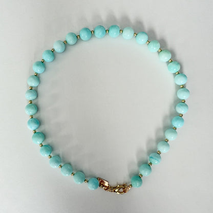 Blue opal necklace with gold beads and gold clasp by Hope and Raye