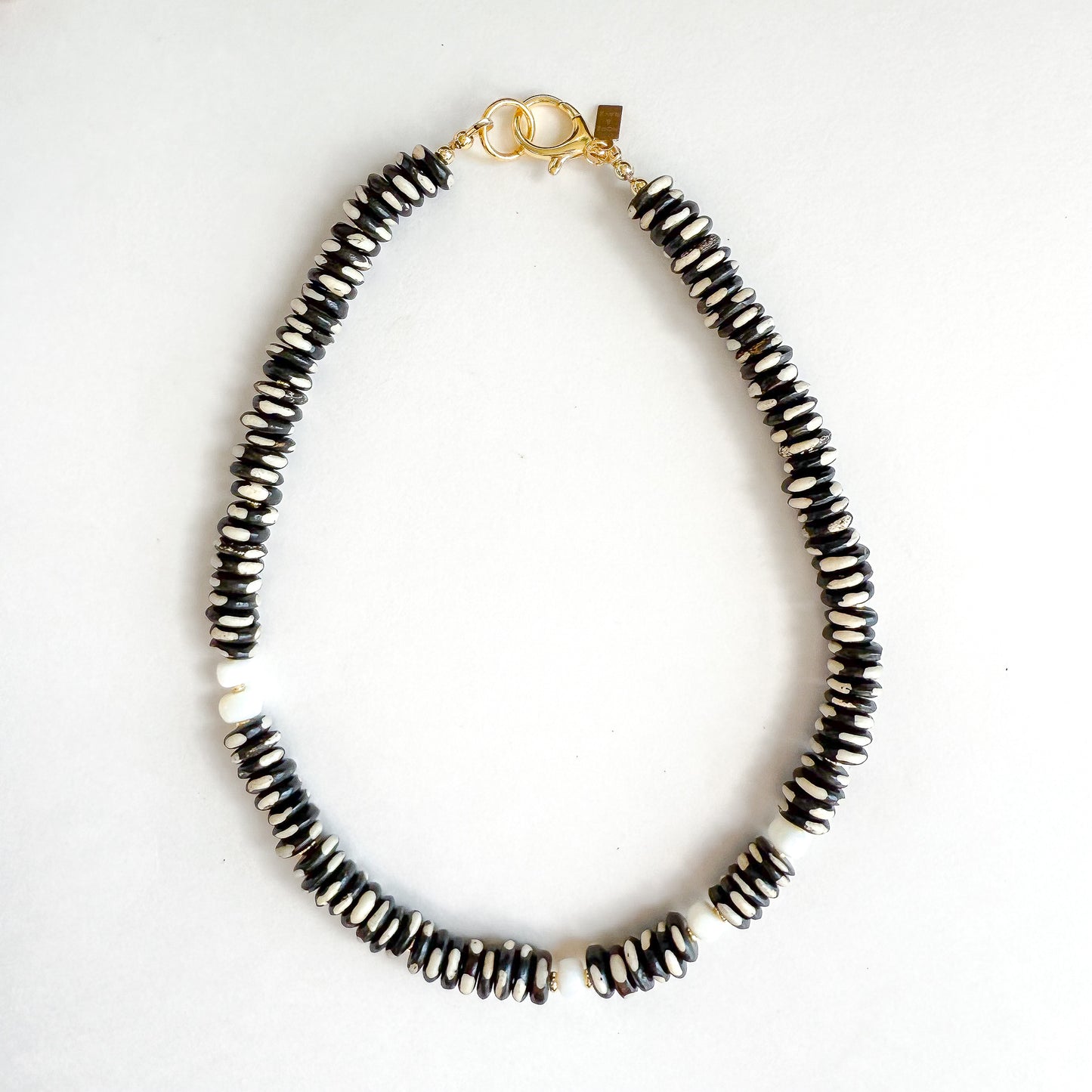 Black and White Dalmatian Jasper 17 inch Necklace with White Opal and Gold-Filled Clasp. Designed by Hope and Raye in Atlanta, GA. 