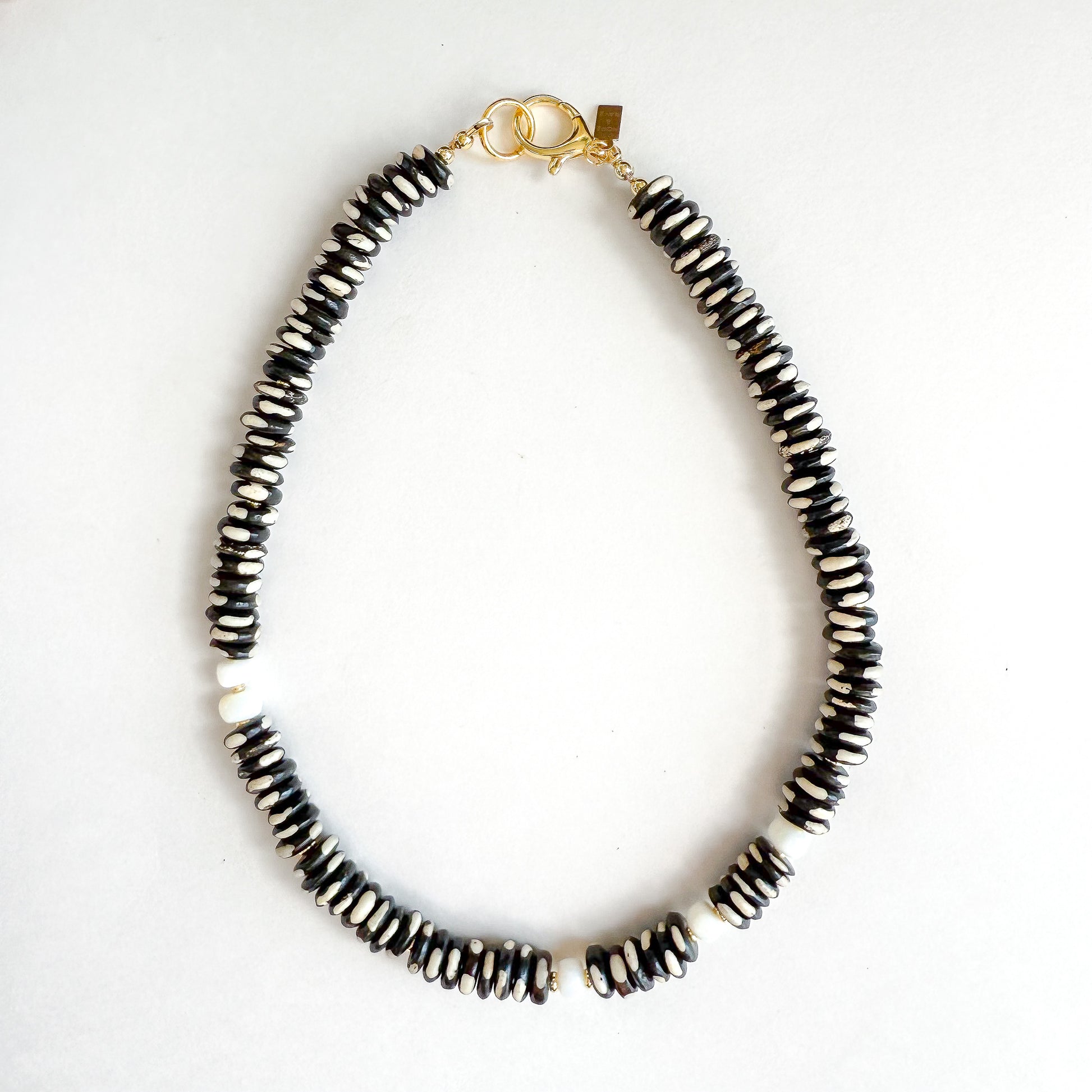 Black and White Dalmatian Jasper 17 inch Necklace with White Opal and Gold-Filled Clasp. Designed by Hope and Raye in Atlanta, GA. 