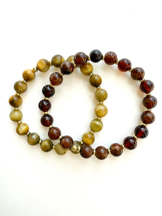Garnet and gold bracelet pair for Gameday school spirit. Stretch bracelets with natural gemstones and gold meant to last for season after season. Ships gift ready. Go Noles! 