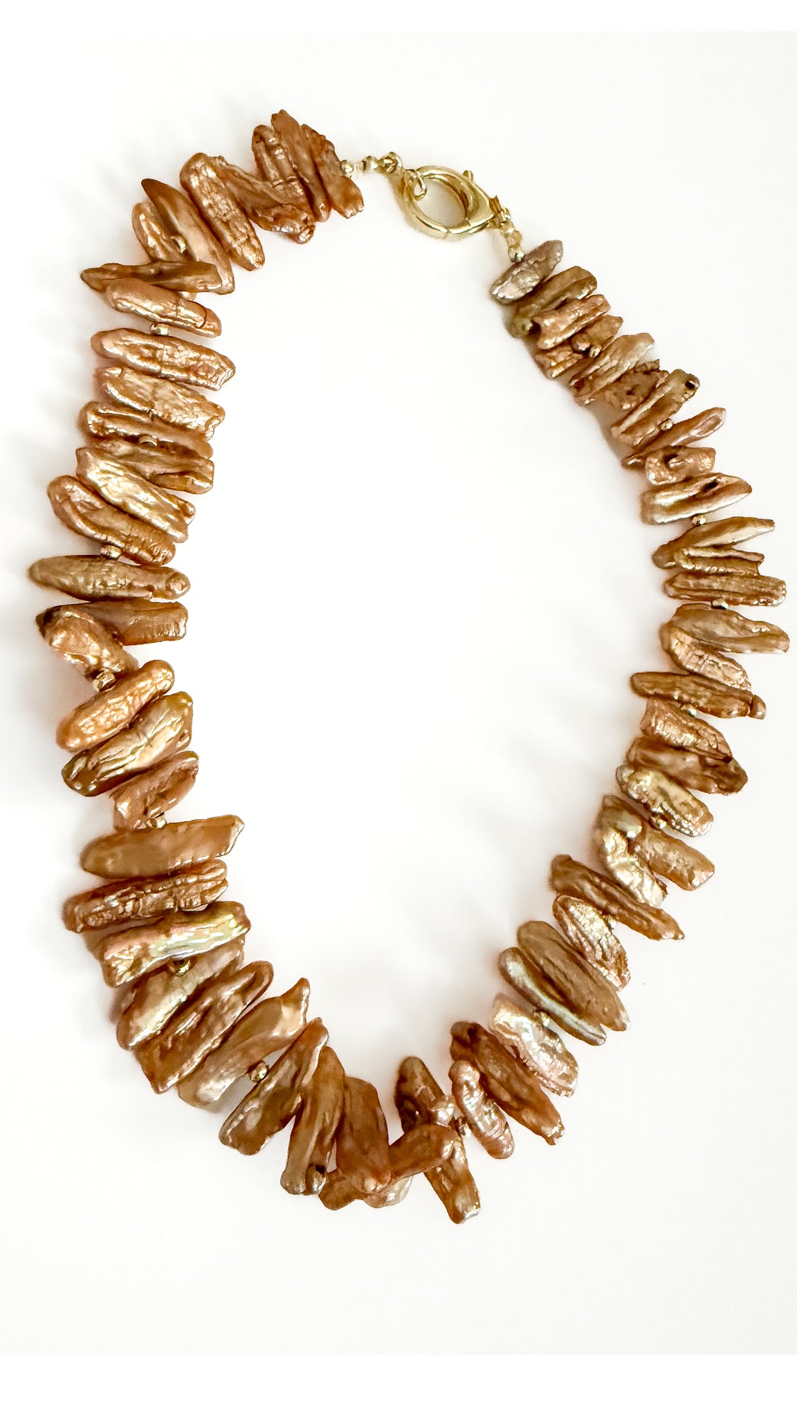 Brown golden stick pearl handcrafted necklace with gold clasp.