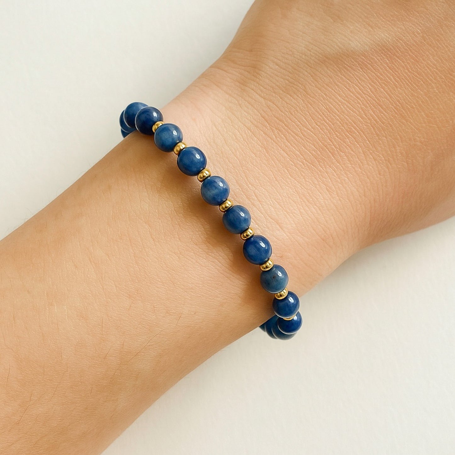 Blue gemstone beaded bracelet with gold handcrafted by Hope & Raye in Brookhaven, Ga. Perfect bracelet for holiday gifting or treating yourself! Natural gemstones, always gold-filled for no tarnish and last wear. 