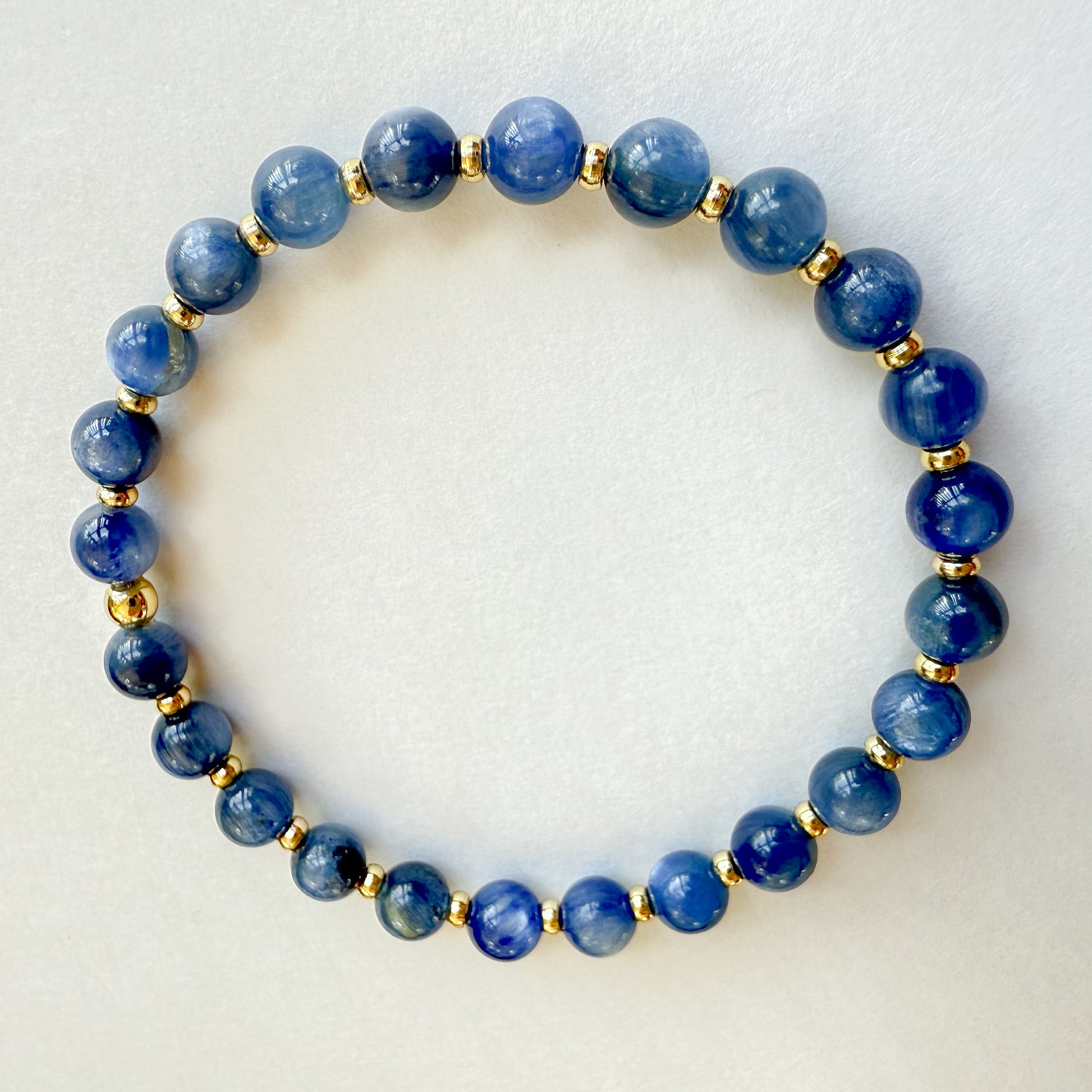 Premium blue kyanite gemstone bracelet with 18K gold filled beads, elegant holiday gift that ships gift ready from Atlanta, Georgia USA.