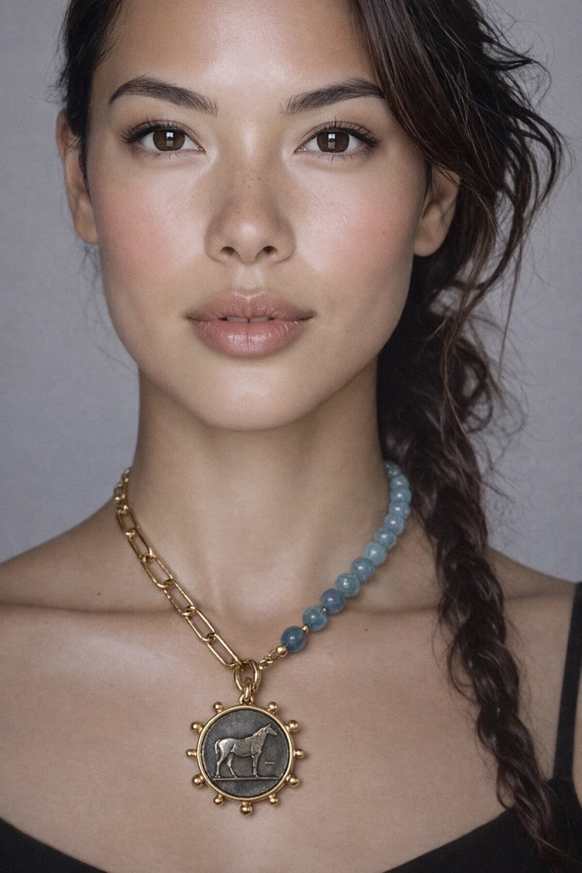 Natural aquamarine and gold chain half-and-half necklace with horse charm. 