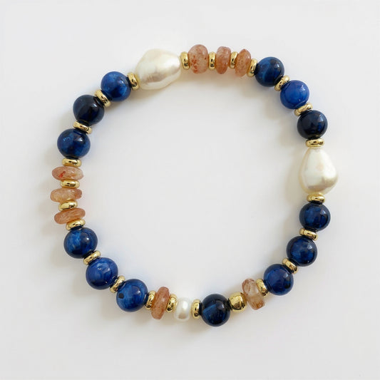 orange and blue stretch bracelet with pearl and gold