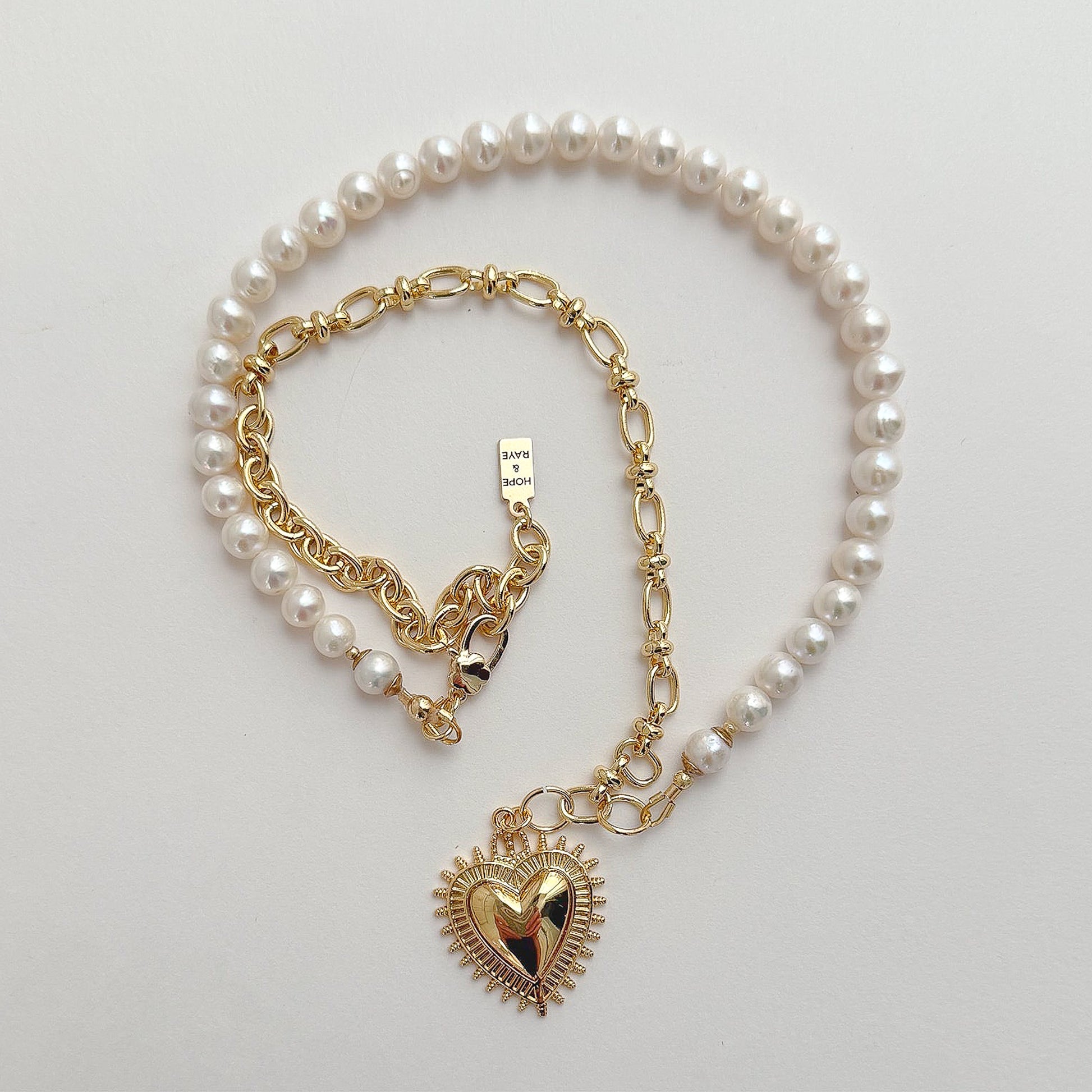 Half and half handcrafted artesian-made necklace with natural freshwater pearls and gold-filled paperclip chain. Finished with a gold-filled heart charm. Ship gift-ready from Atlanta, GA, USA. Perfect holiday gift for her or valentine necklace. 