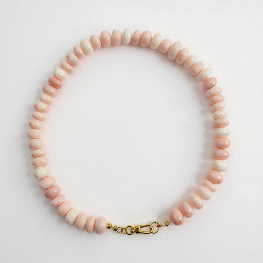 Pink Peruvian oval smooth natural 16 inch necklace with gold clasp. Handmade by Hope and Raye.
