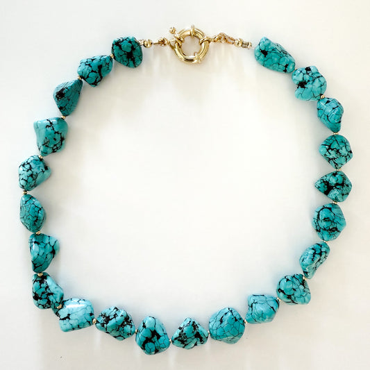 Turquoise nugget necklace with gold filled beads and a gold filled clasp. Measures 16 inches. Lasting handcrafted jewelry. 