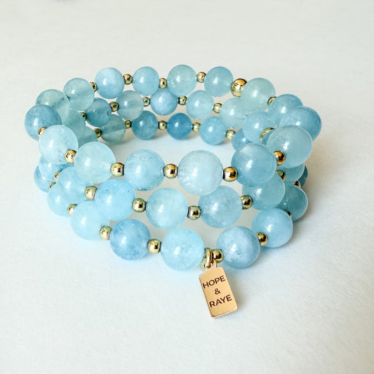 3 7.5mm aquamarine beaded stretch bracelets with gold-filled accents by Hope and Raye 
