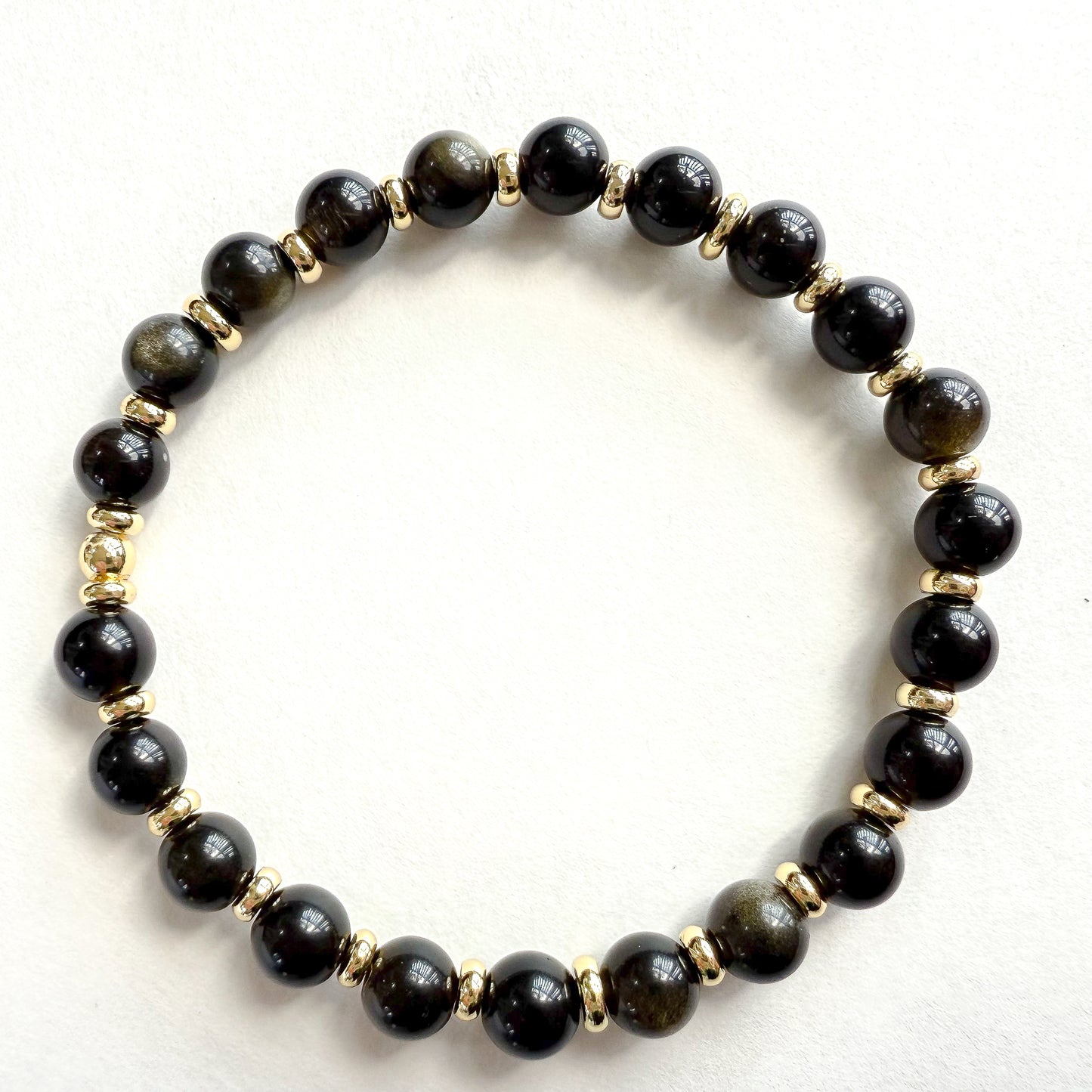 Black beaded stretched bracelet handcrafted in Atlanta, Georgia USA by a woman-owned jewelry designer, Hope & Raye. Perfect for holiday gifting. Ships gift-ready in a signature jewelry box with velvet pouch. 