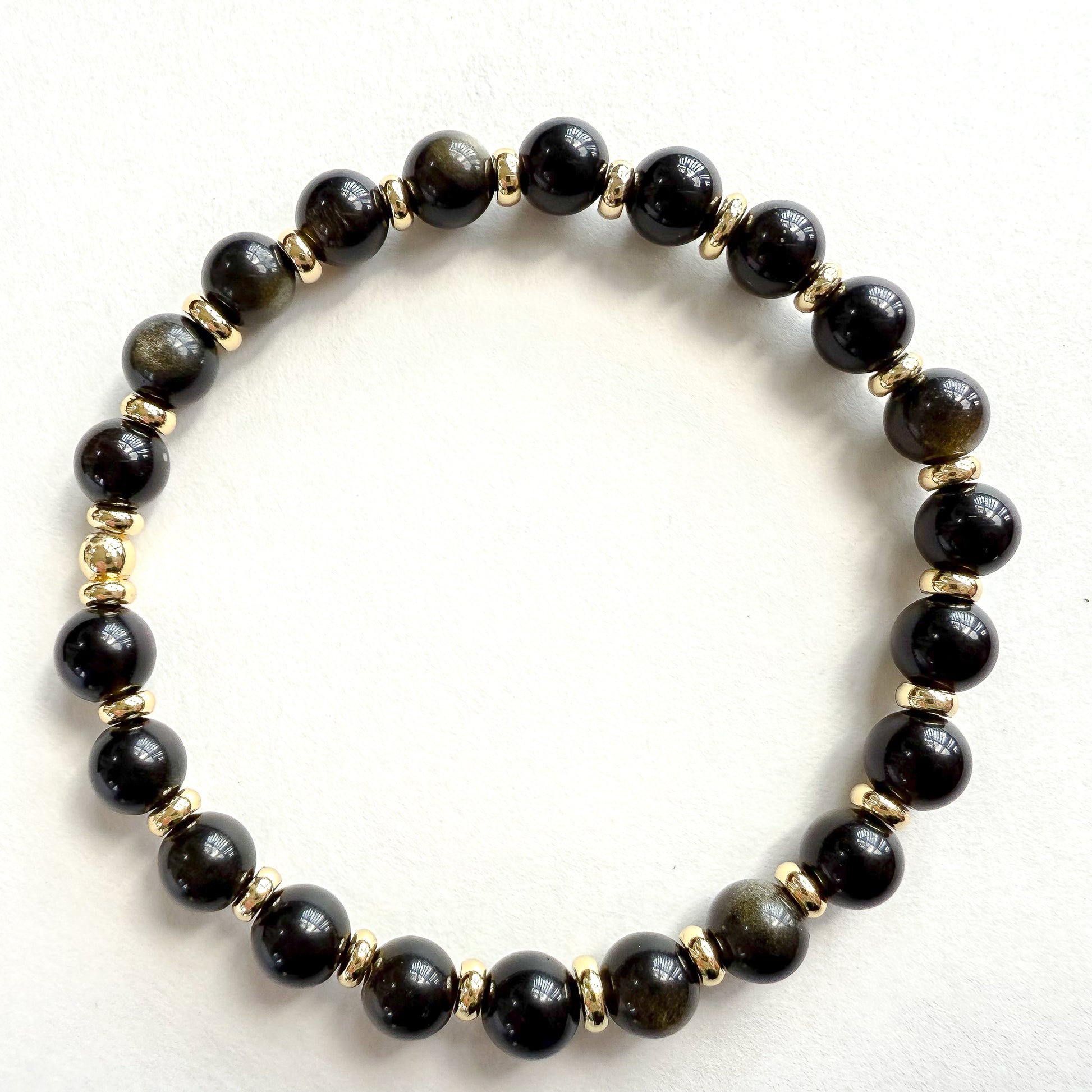 Black beaded stretched bracelet handcrafted in Atlanta, Georgia USA by a woman-owned jewelry designer, Hope & Raye. Perfect for holiday gifting. Ships gift-ready in a signature jewelry box with velvet pouch. 