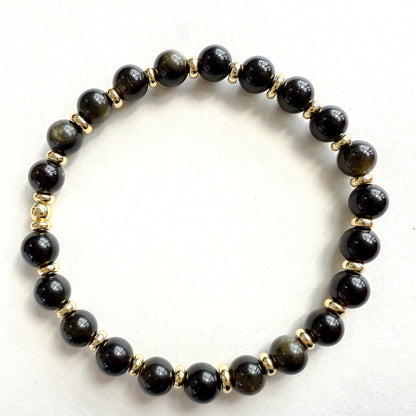 Black beaded stretched bracelet handcrafted in Atlanta, Georgia USA by a woman-owned jewelry designer, Hope & Raye. Perfect for holiday gifting. Ships gift-ready in a signature jewelry box with velvet pouch. 