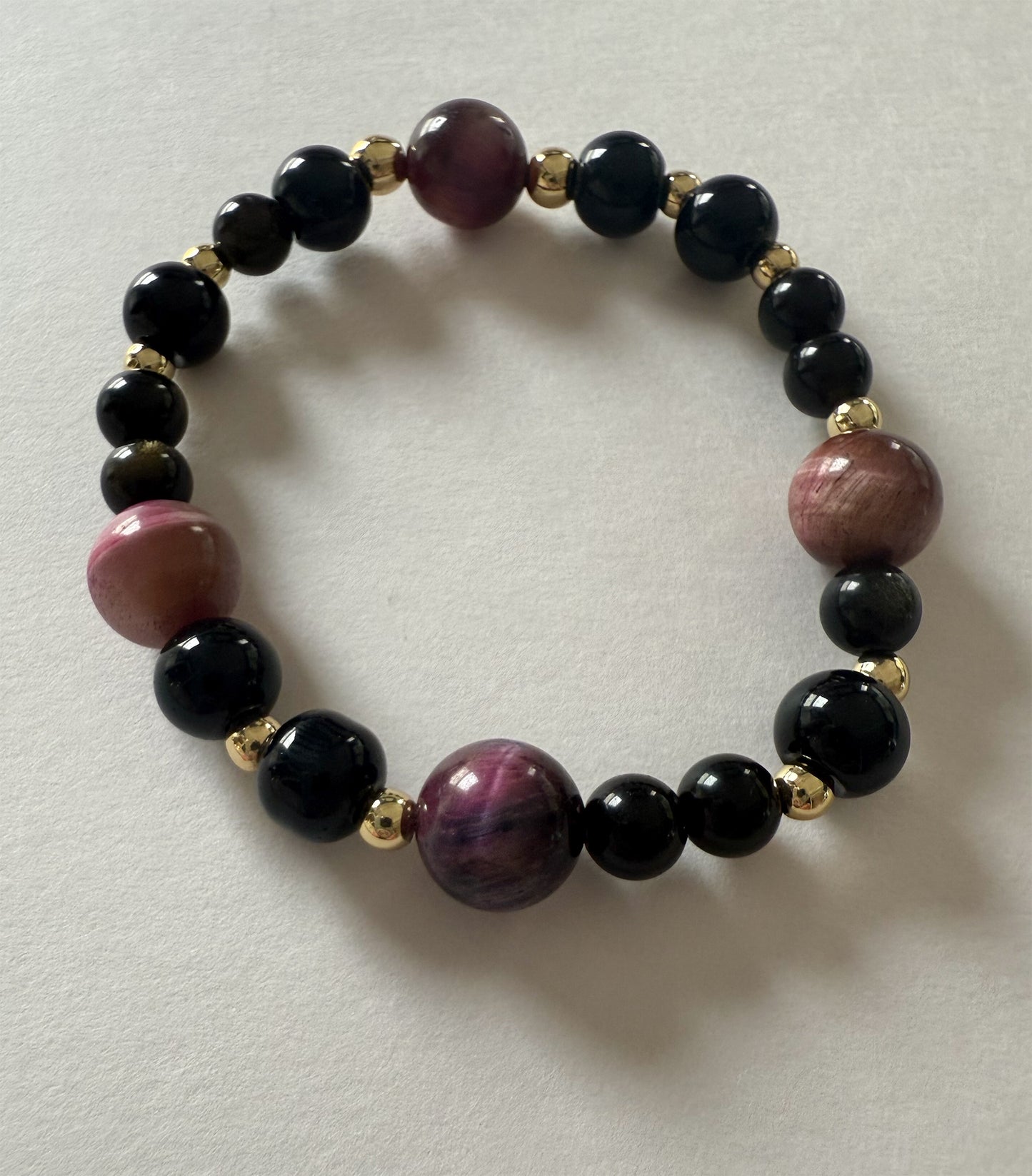 Elegant black onyx, cat's eye and gold beaded stretch bracelet by Hope and Raye