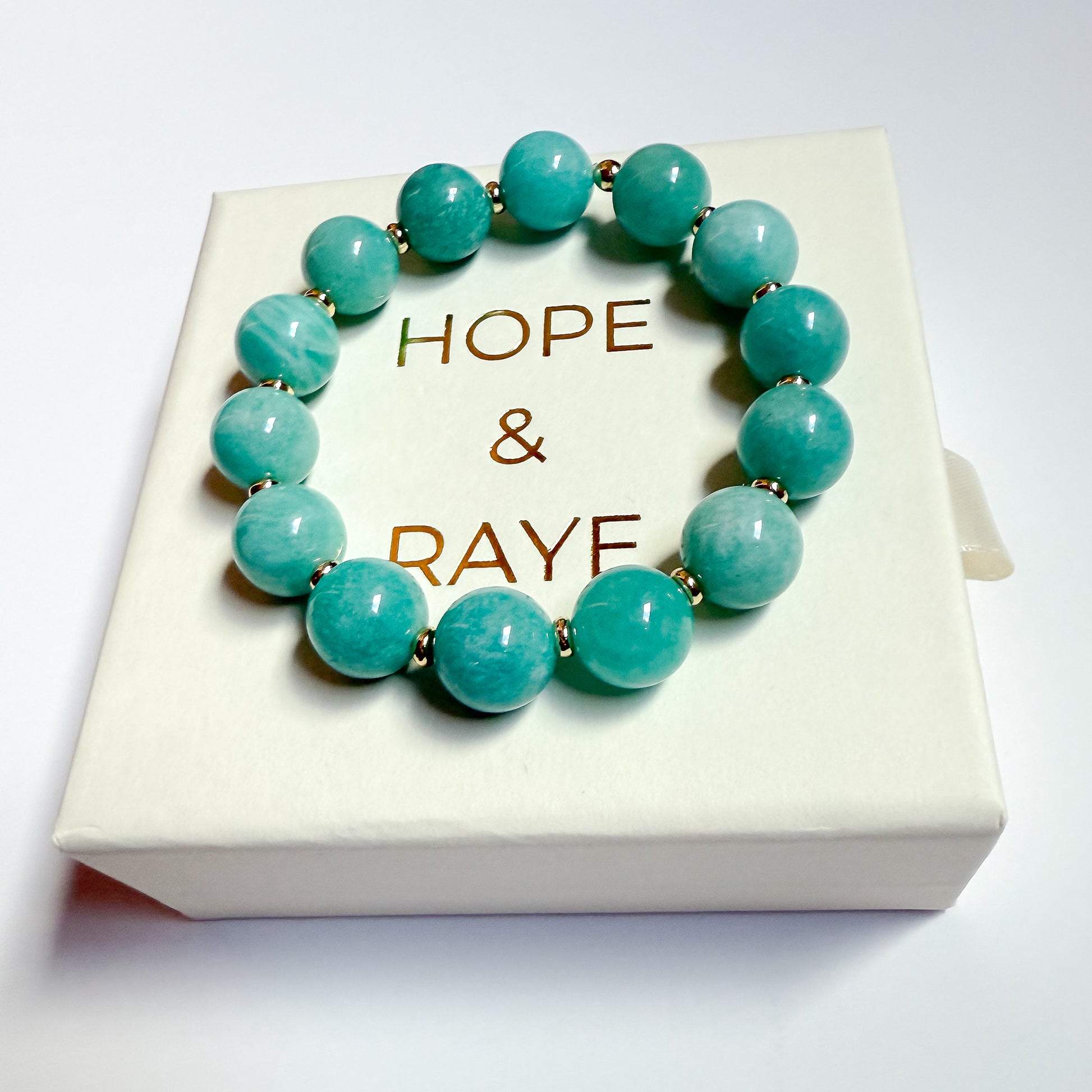 Natural amazonite with gold beaded stretch statement with jewelry box included in purchase. Handcrafted in Atlanta.