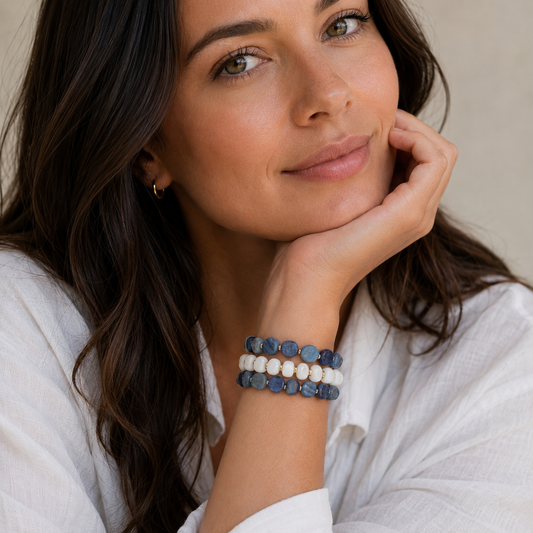 model wearing HOPE & RAYE's blue gemstone and opal bracelet set of 3