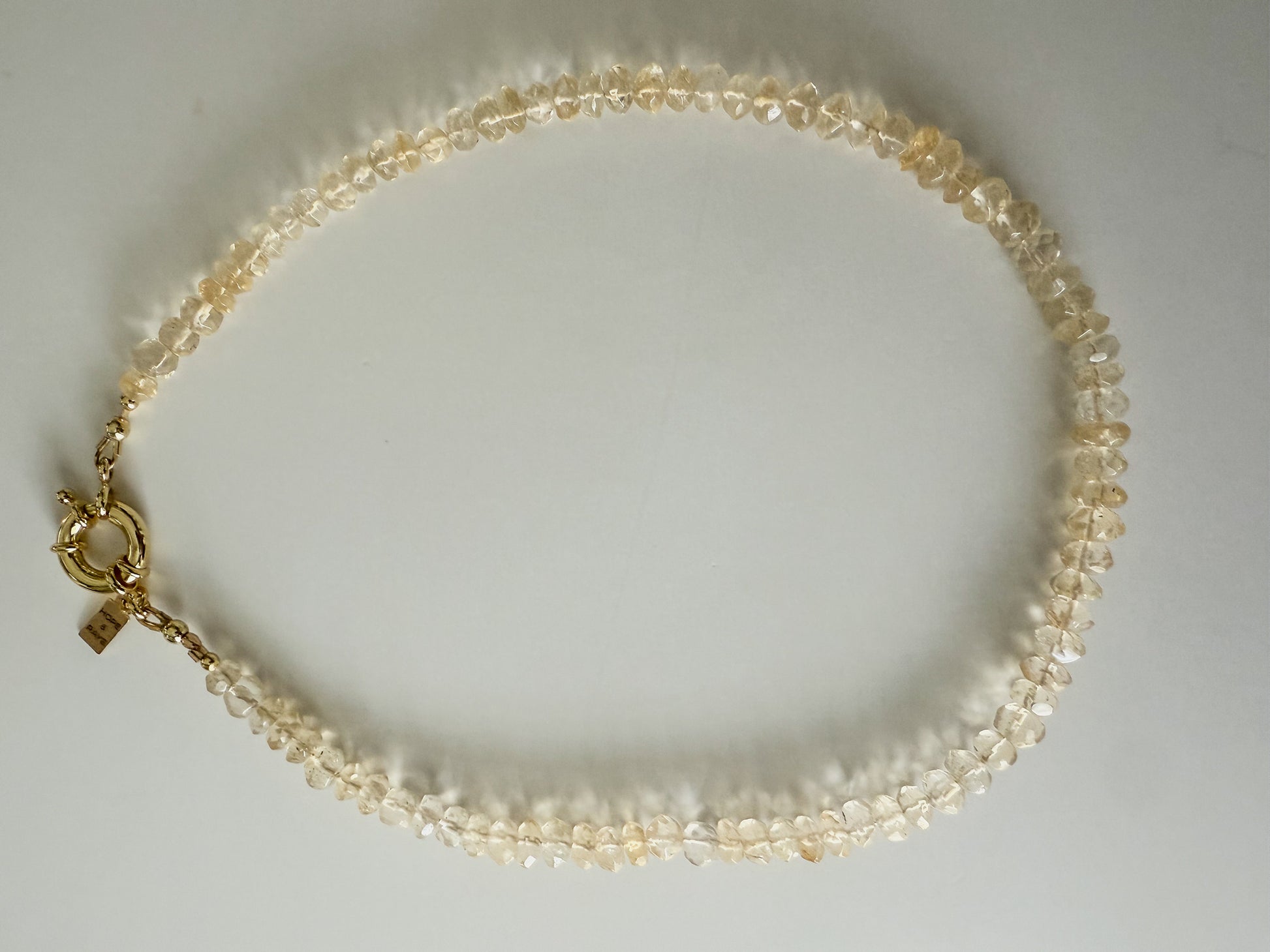 Citrine beaded 16 inch necklace with gold clasp 