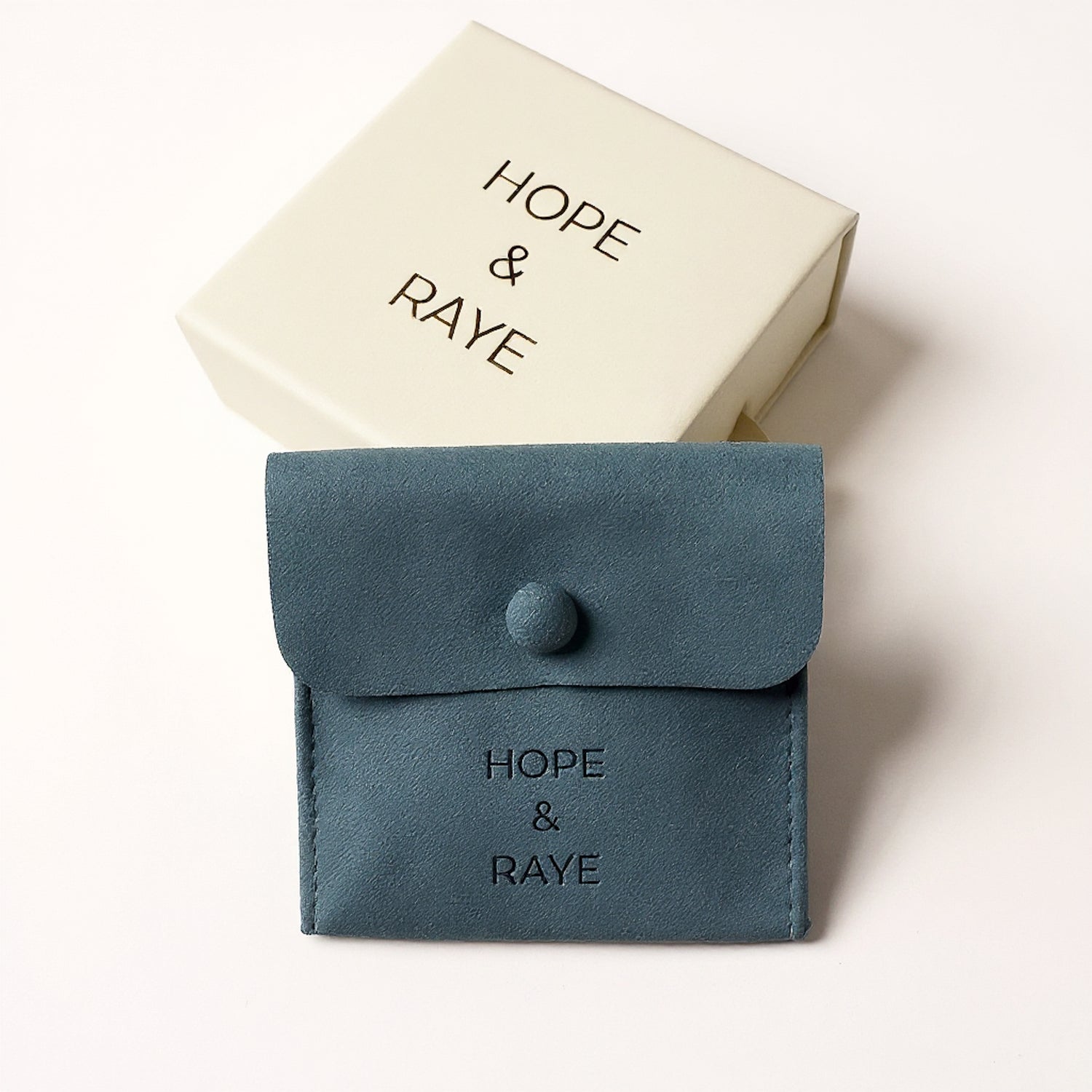HOPE & RAYE branded gift box and teal velvet jewelry pouch