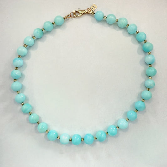 Turquoise opal beaded necklace with gold beads and gold clasp.