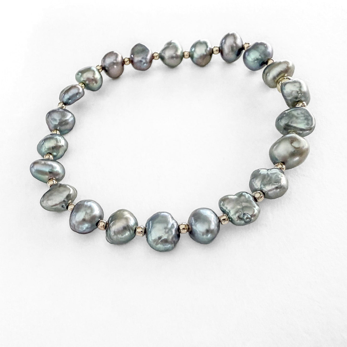 Peacock pearl stretch bracelet with gold- filled beads by Hope and Raye 