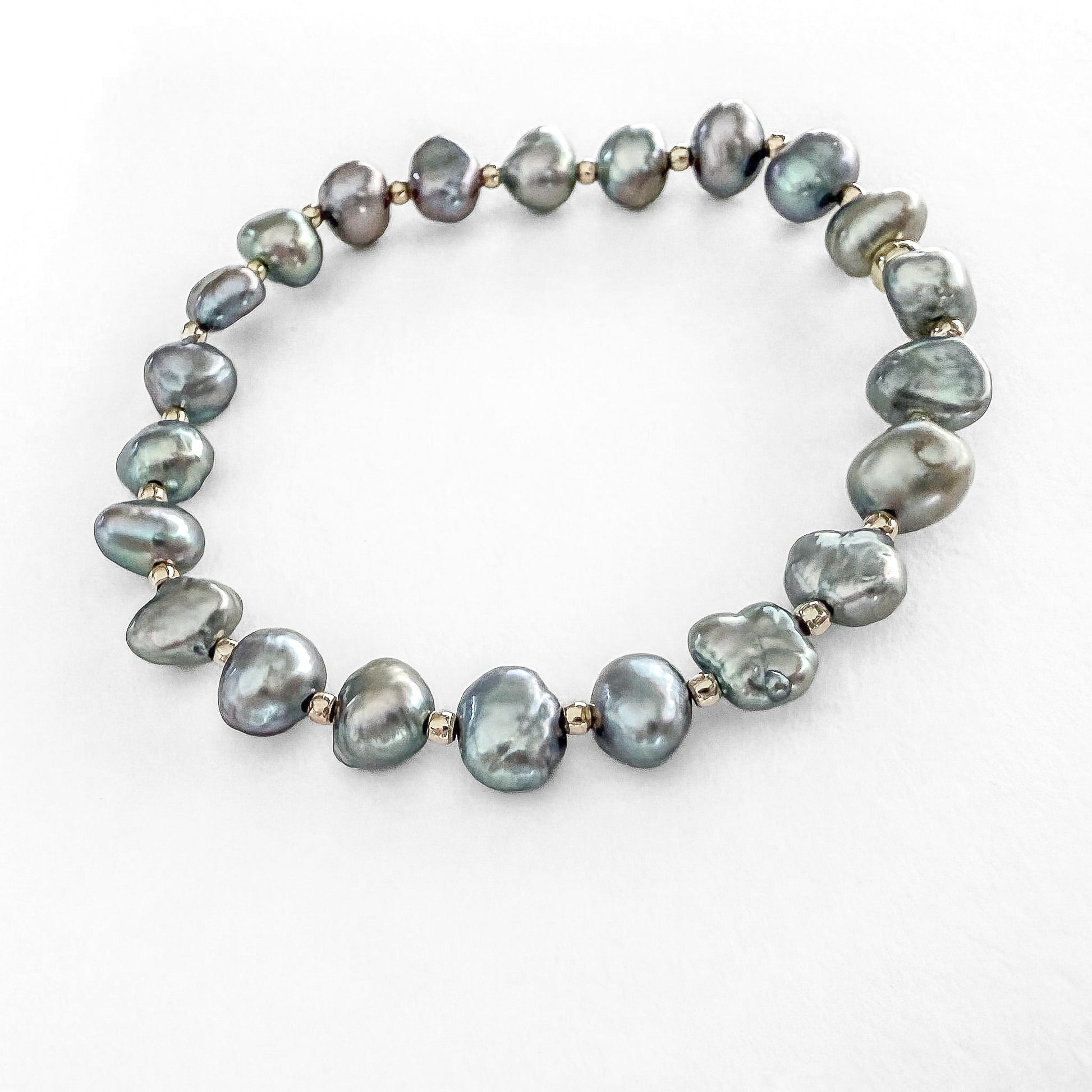 Peacock pearl stretch bracelet with gold- filled beads by Hope and Raye 