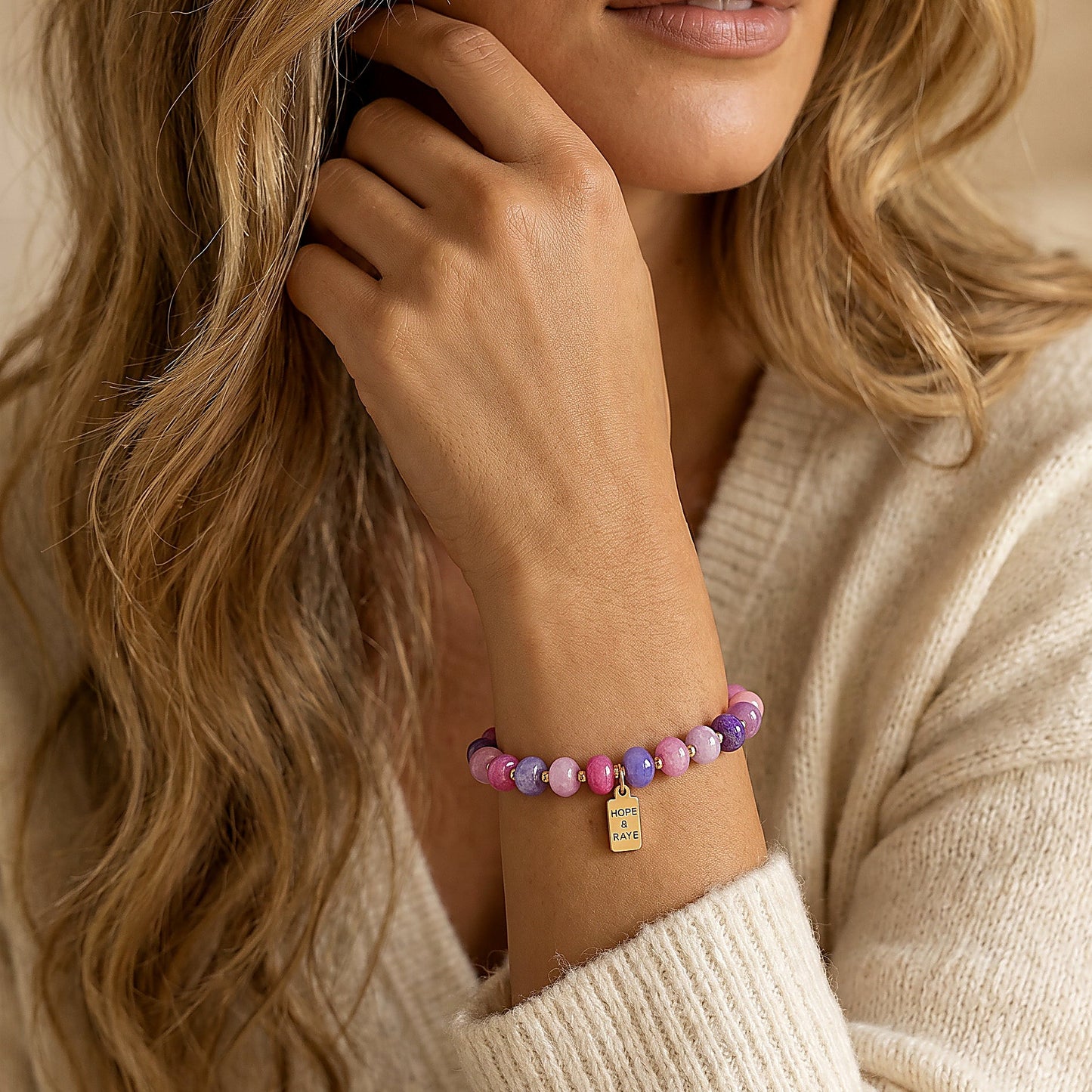 purple gemstons bracelet with gold beads