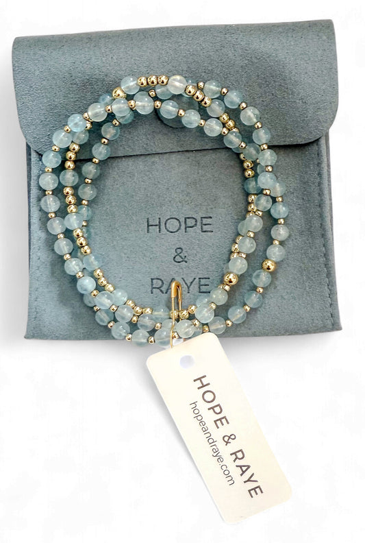 Aquamarine and gold bracelet stack of 3 handcrafted flexible material bracelets perfect for everyday wear. Dainty and ships gift ready. 