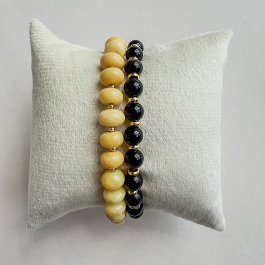 Yellow opal with 18k gold beaded bracelet. Black Falcon’s eye beaded bracelet with 18k gold filled discs. A pre-designed beaded bracelet pair for gifting. 
